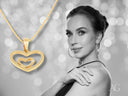 14K yellow gold heart diamond pendant with radiant inner heart design