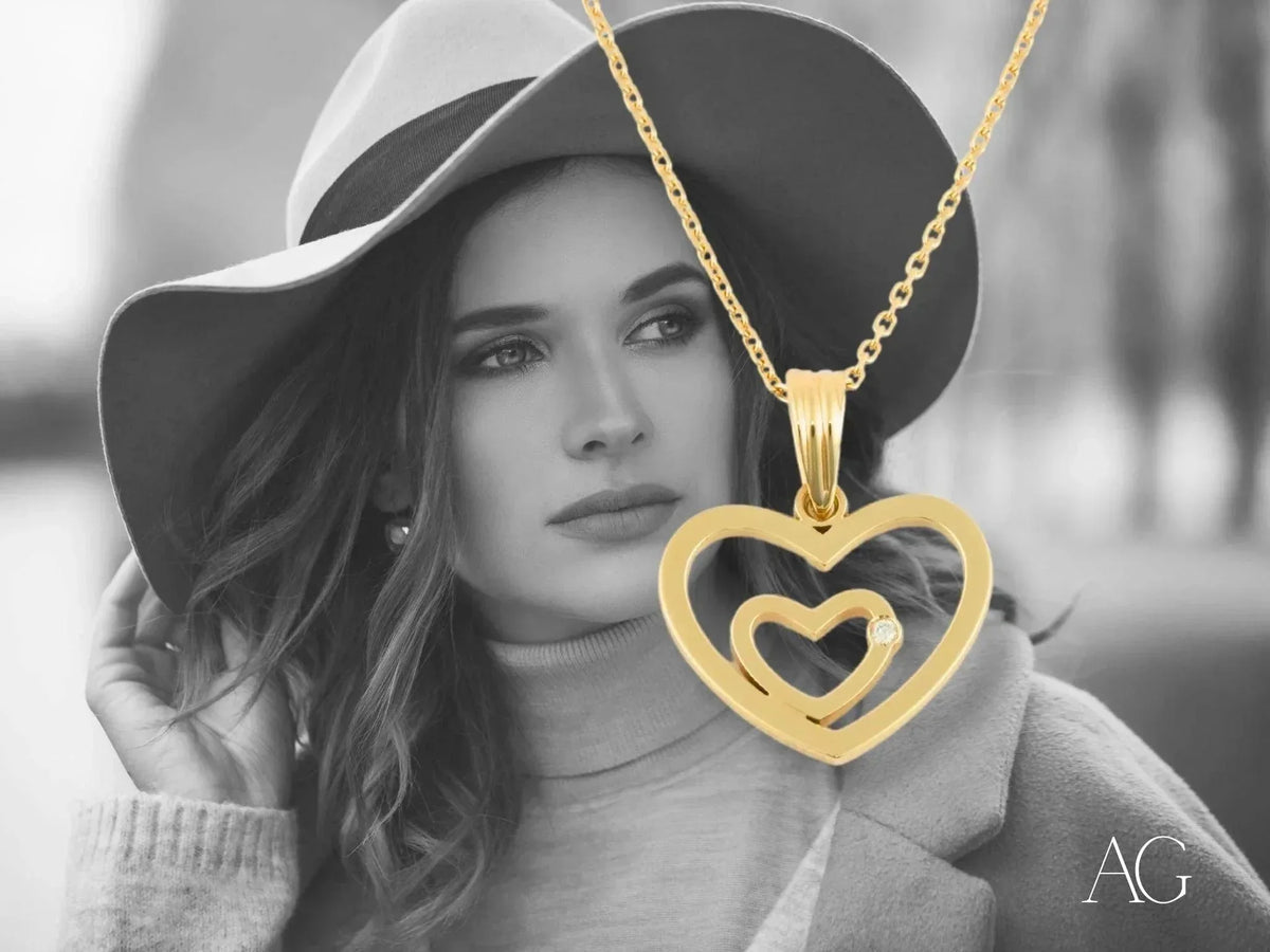 14k yellow gold heart diamond pendant with radiant diamond accent