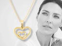 14k yellow gold heart diamond pendant with inner outline and clear gemstone
