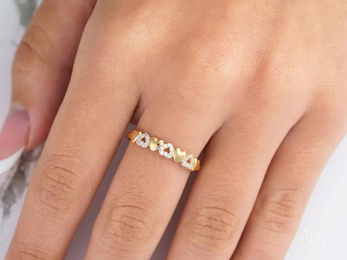 18k yellow gold CZ heart ring with elegant diamond-encrusted motifs
