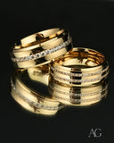 Gold and diamond wedding rings with multiple bands from Limitless Custom Jewelry Designs
