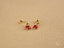 Pair of 18k gold ladybug earrings with red charms to bring good luck and elegance