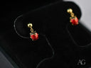 18k gold ladybug earrings with red dangle charms to bring good luck