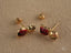 Elegant 18k gold ladybug stud earrings with red and black enamel for kids