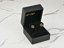 Pair of 18K gold green CZ clover earrings in black velvet box