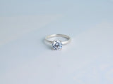 Lumina Promise Solitaire: silver classic four-prong diamond ring