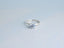 Lumina Promise Solitaire classic four‑prong silver engagement ring with brilliant-cut diamond