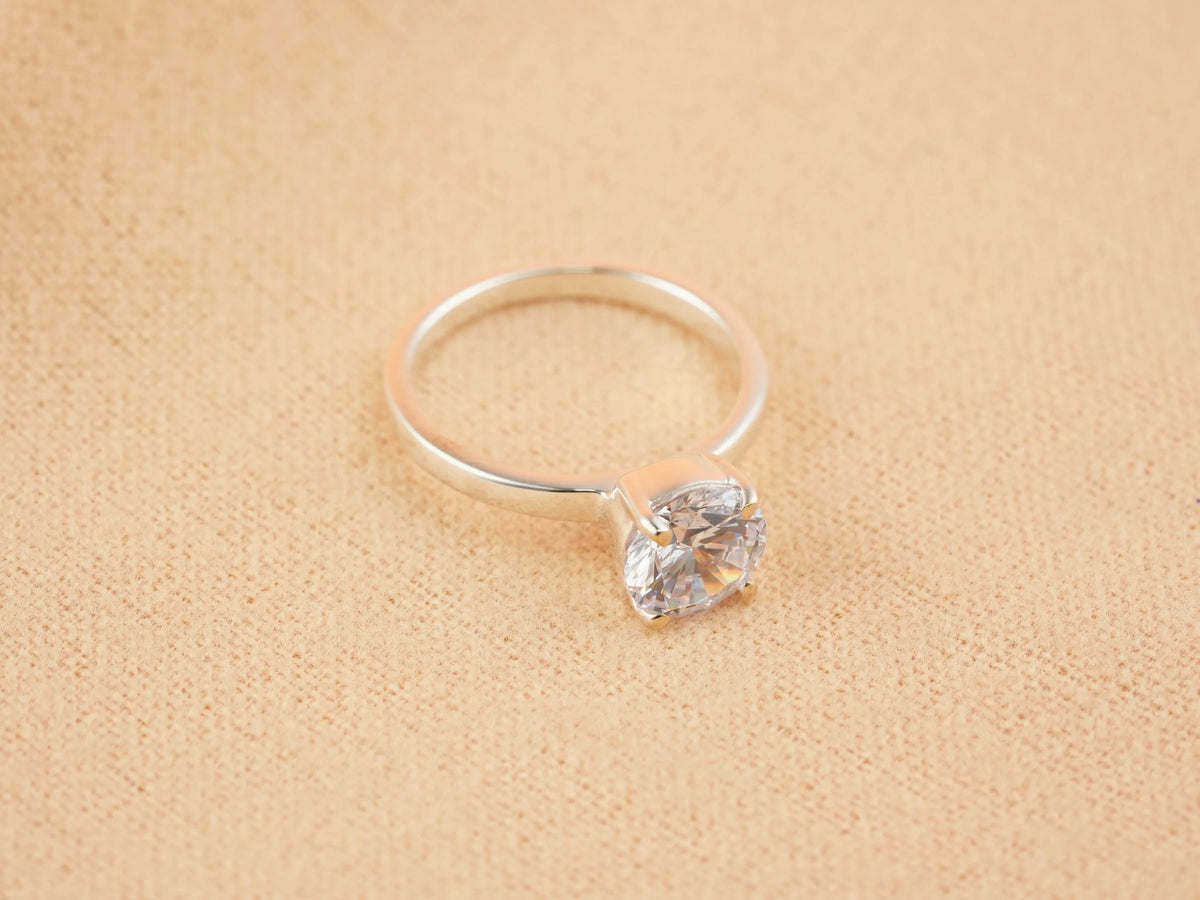 Silver Lumina Promise Solitaire engagement ring with round clear gemstone