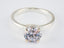 Lumina Promise Solitaire silver engagement ring with classic four-prong round-cut diamond