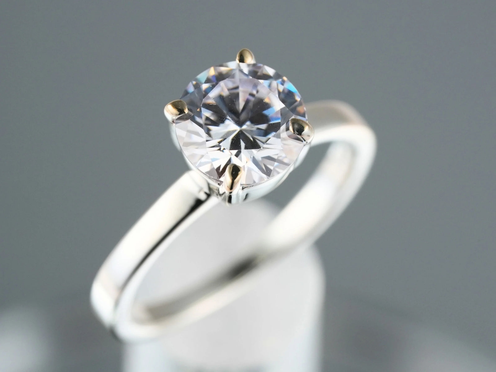 Lumina Promise Solitaire: silver classic four-prong diamond ring