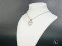 Luminous Heart 18k white gold pendant with textured diamond pattern