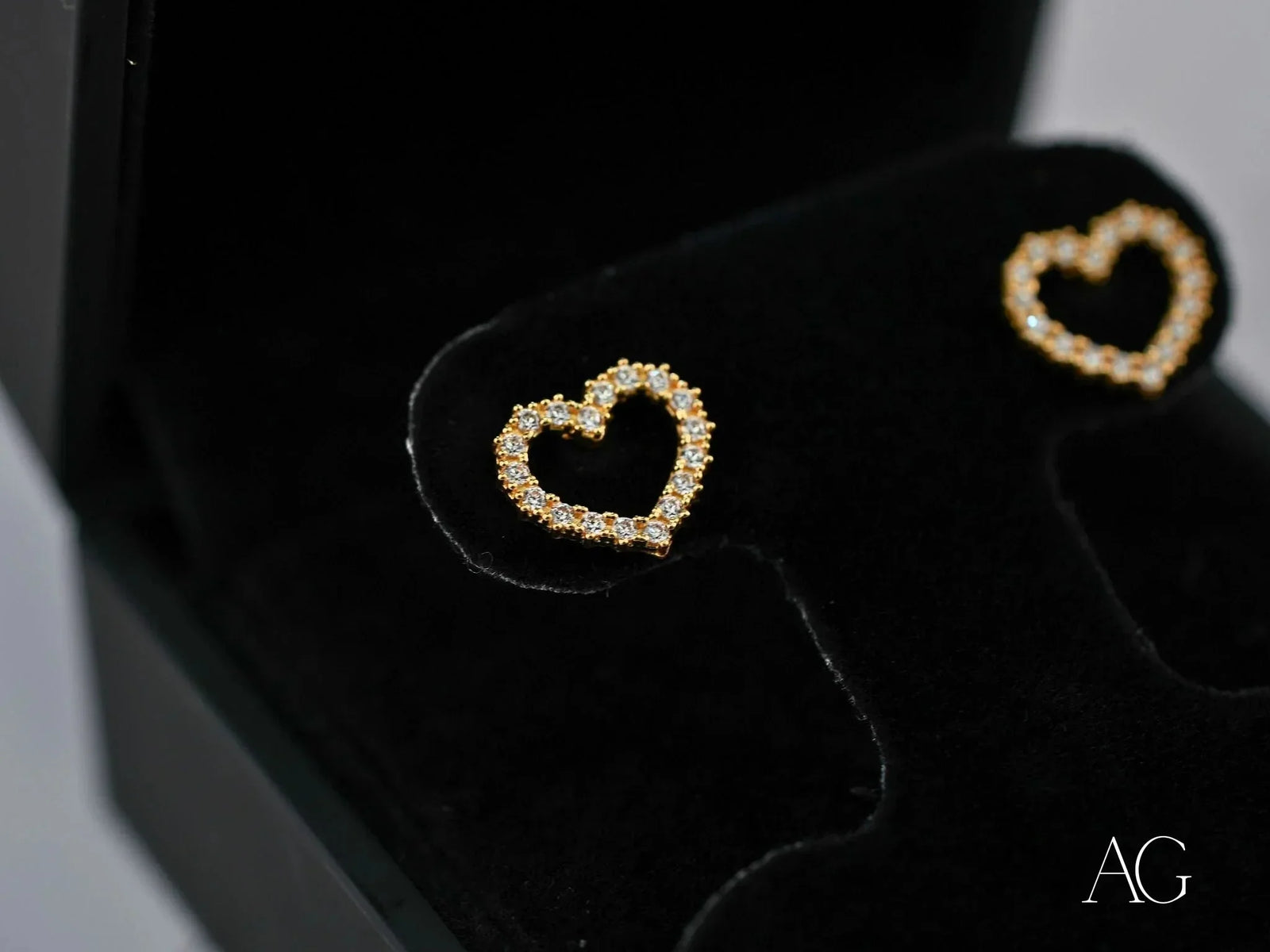 Lustrous Love radiant 18k gold CZ heart stud earrings with sparkling stones