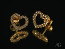 Lustrous Love radiant 18k gold heart stud earrings with CZ gems