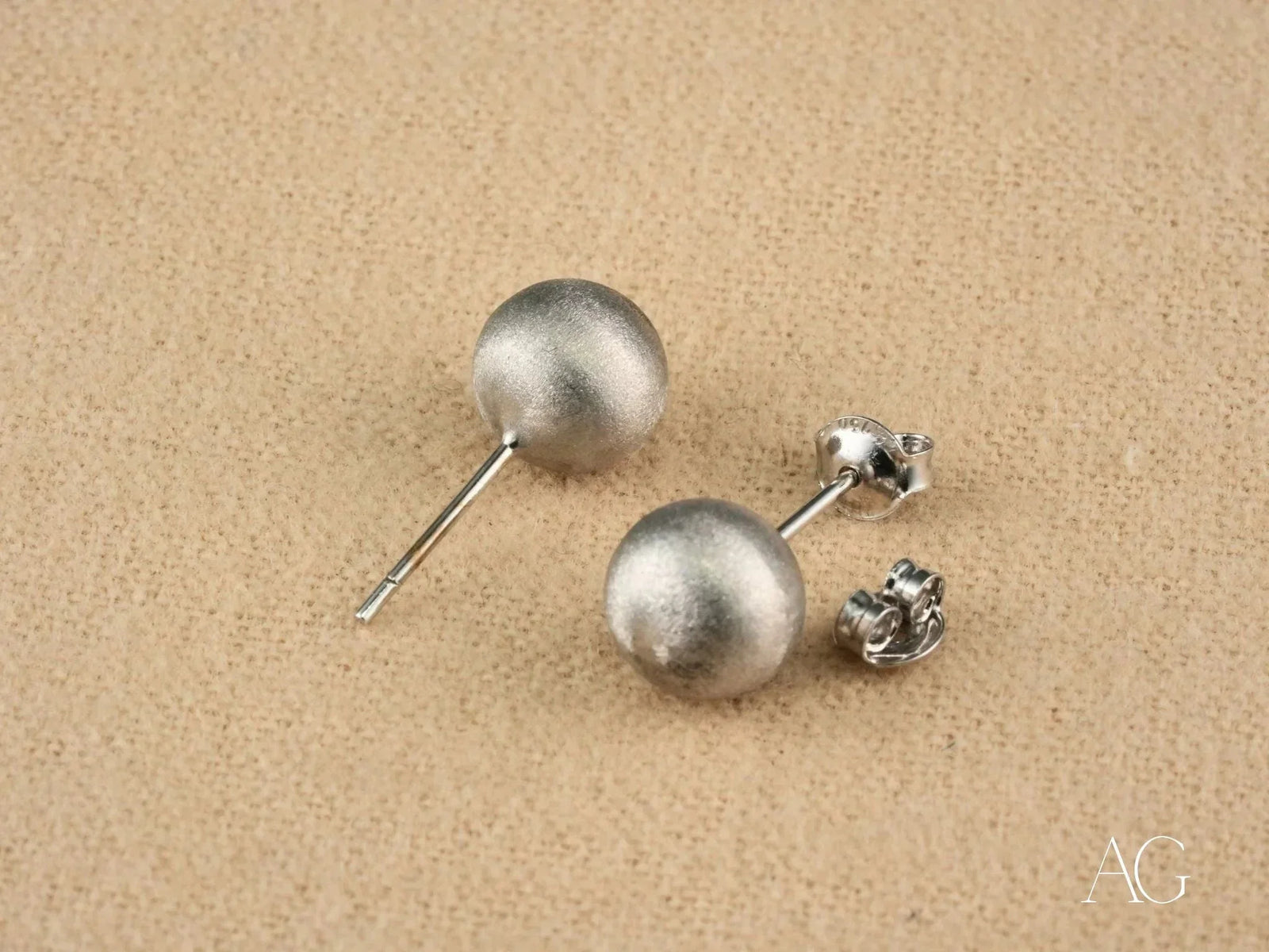 Pair of 18k white gold matte silver ball stud earrings