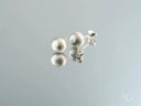 Pair of 18k white gold matte silver ball earrings