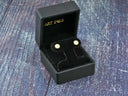 Luxe Brilliance 18K yellow gold pave CZ stud earrings in black box
