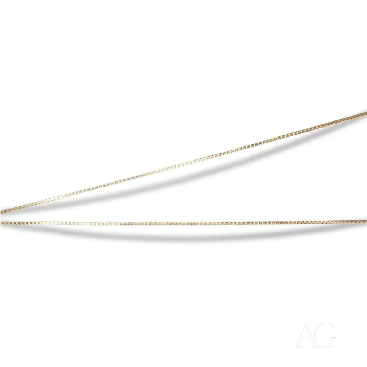 Luxurious 14k gold box chain with two delicate curved links on white background