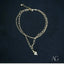 Gold-colored 18k double chain anklet with heart charm, part of Luxurious Art Gold Jewelry collection