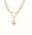 Gold layered chain necklace with puffed heart charm, showcasing art gold jewelry in 18k double chain anklet style