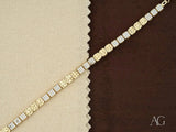 Luxurious solid 18k gold bracelet with polished gold square links and cubic zirconia