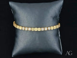 Luxurious solid 18k gold bracelet with alternating rows of polished gold and cubic zirconia