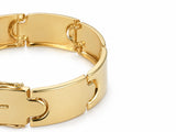 Macro detail of luxurious men's 18k gold bracelet link
