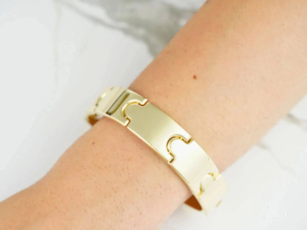 Luxurious solid 18k gold men’s bracelet with puzzle links and open box clasp