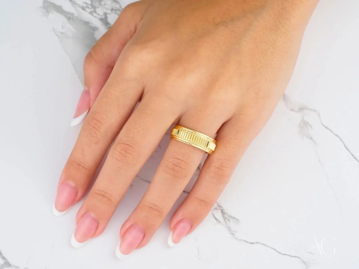 Majestic weave gold wedding band on woman’s hand