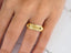 Majestic Weave gold wedding band with textured ribbed design and polished edges