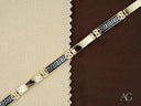 Men’s art gold jewelry bracelet with white gold details and intricate black accents