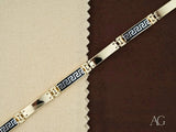 Men’s art gold jewelry bracelet with white gold details and intricate black accents