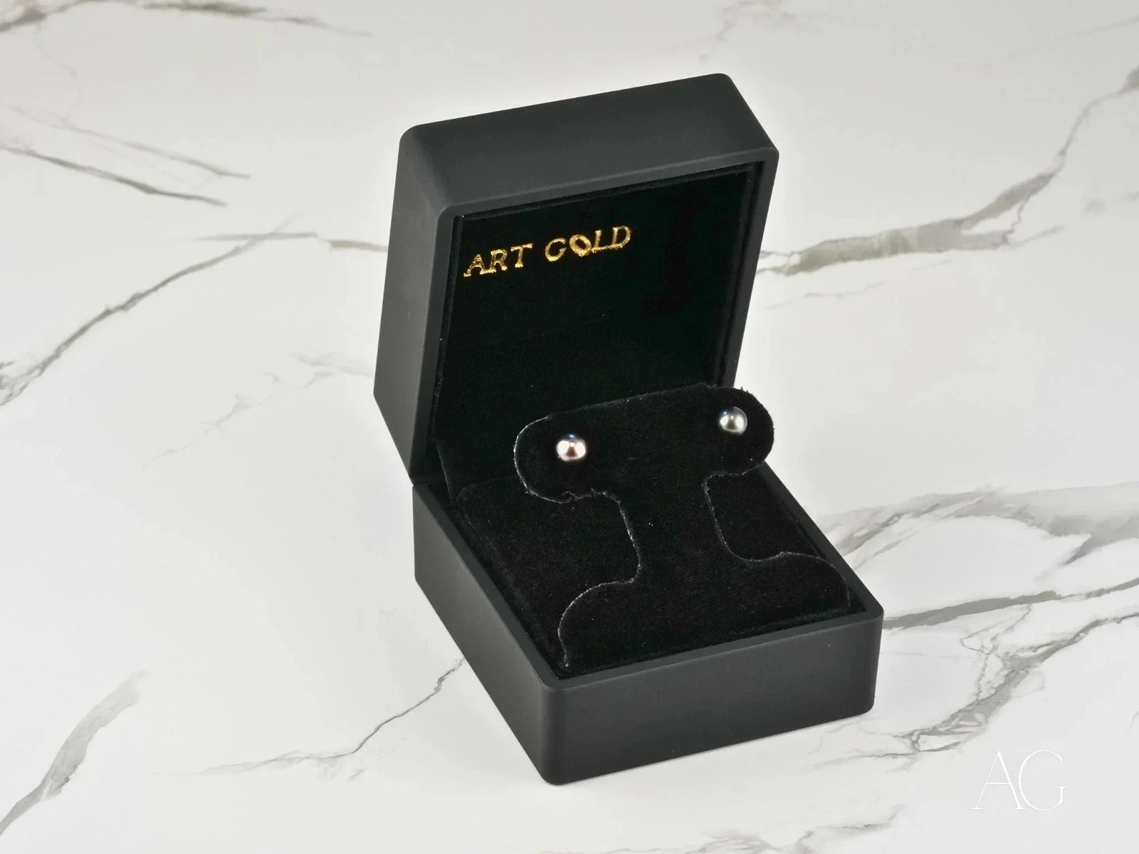 Midnight Elegance black pearl stud earrings in silver box