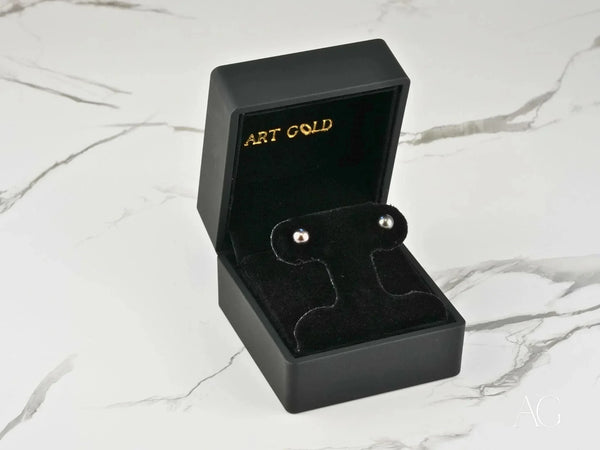 Midnight Elegance black pearl stud earrings in silver box