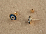 18k gold evil eye earrings with mystic blue white enamel design