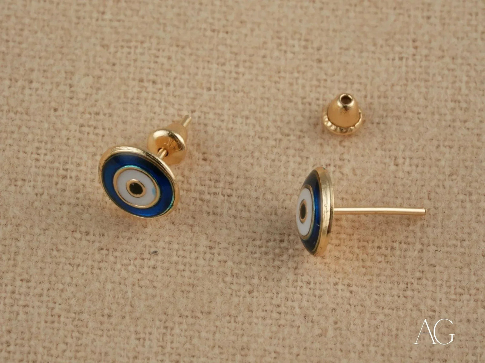 18k gold evil eye earrings with mystic blue white enamel design