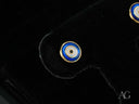 Mystic evil eye 18k gold stud earrings with blue enamel circles