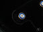 Gold-rimmed evil eye earrings with concentric blue, white, and black enamel circles