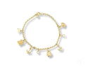 Exquisite 18k gold charm bracelet with nautical elegance and sea-inspired charms