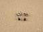 Silver black diamond stud earrings in 18k white gold from Noir Elegance art gold jewelry