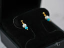 Ocean Breeze 18k gold pearl earrings with vibrant turquoise bead