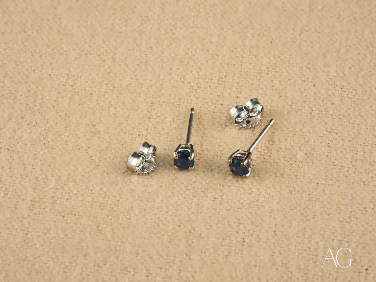 silver-toned fine jewelry rings with intricate designs and dark stone accents featured in the story of jewelers and gold jewelry