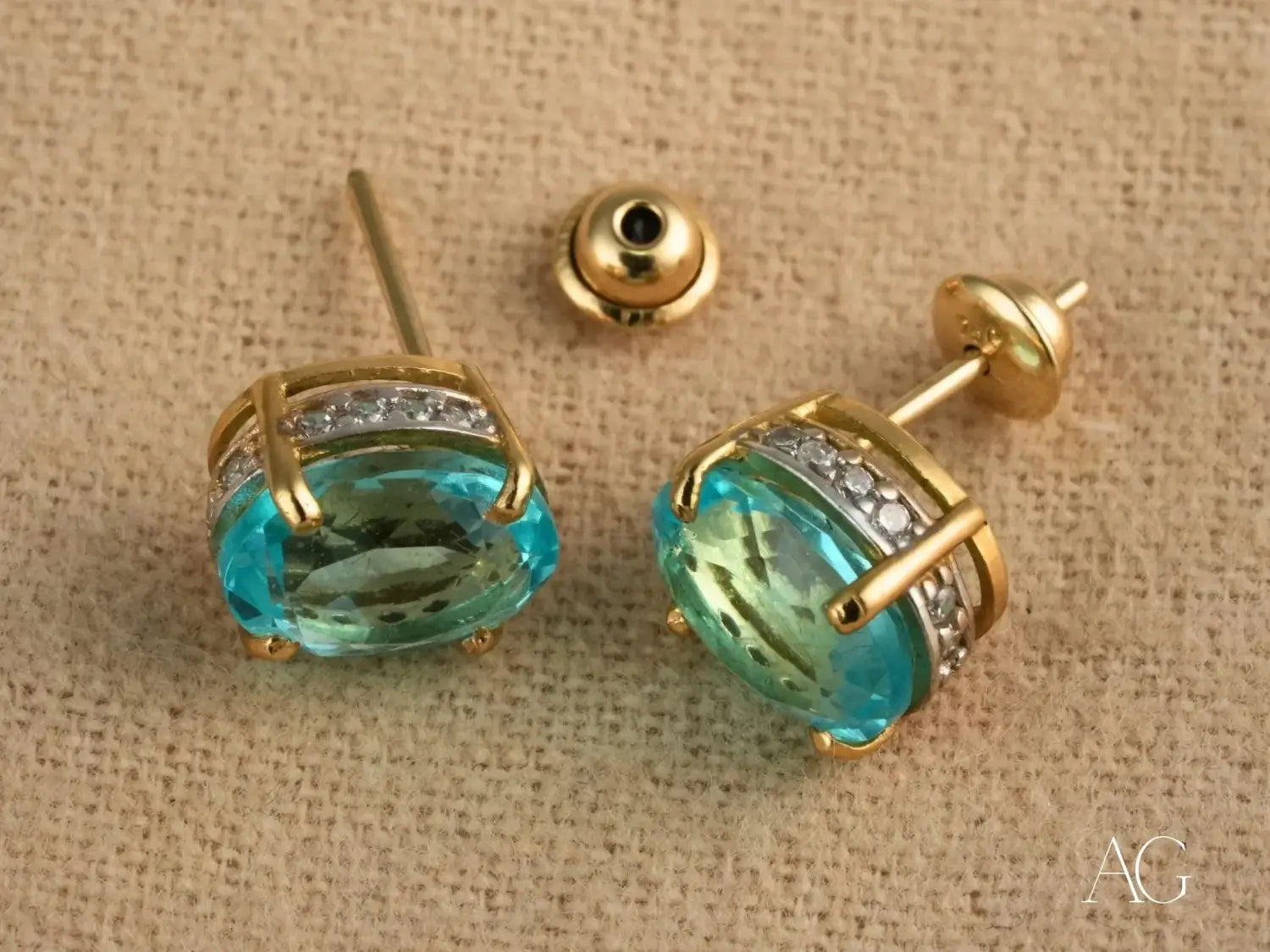 Azure Embrace: 18k Gold Oval Blue Topaz & CZ Halo Earrings