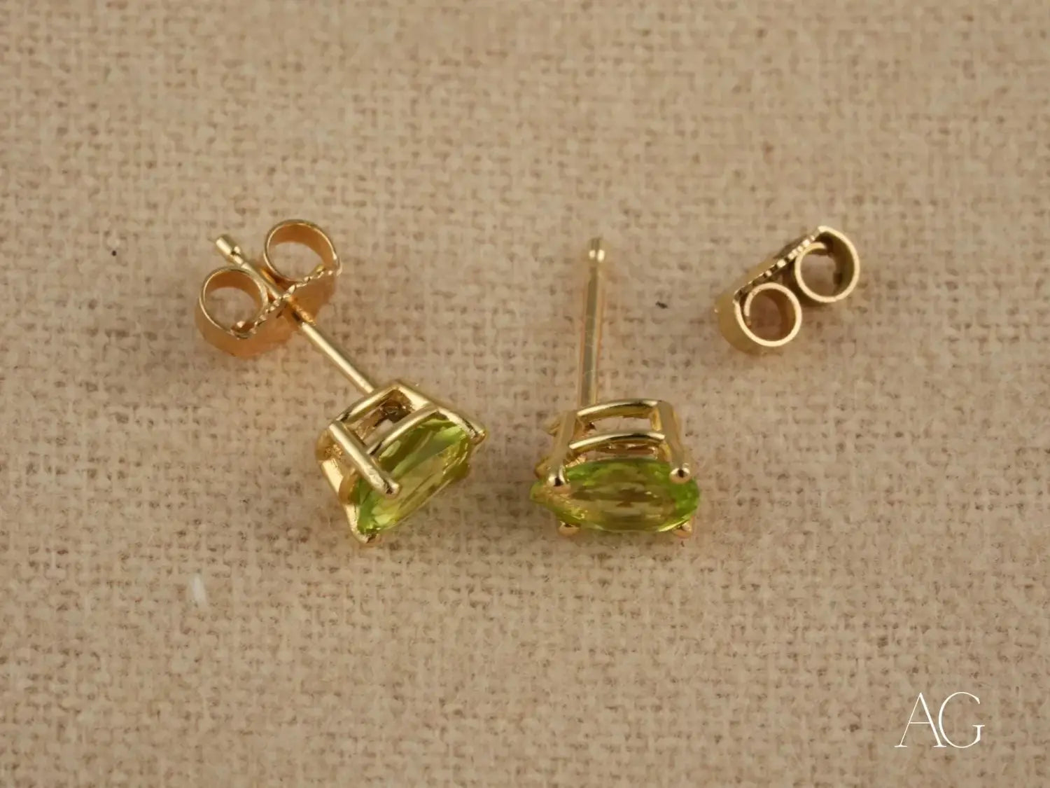 Peridot Radiance: 18k Gold Pear-Shaped Earrings