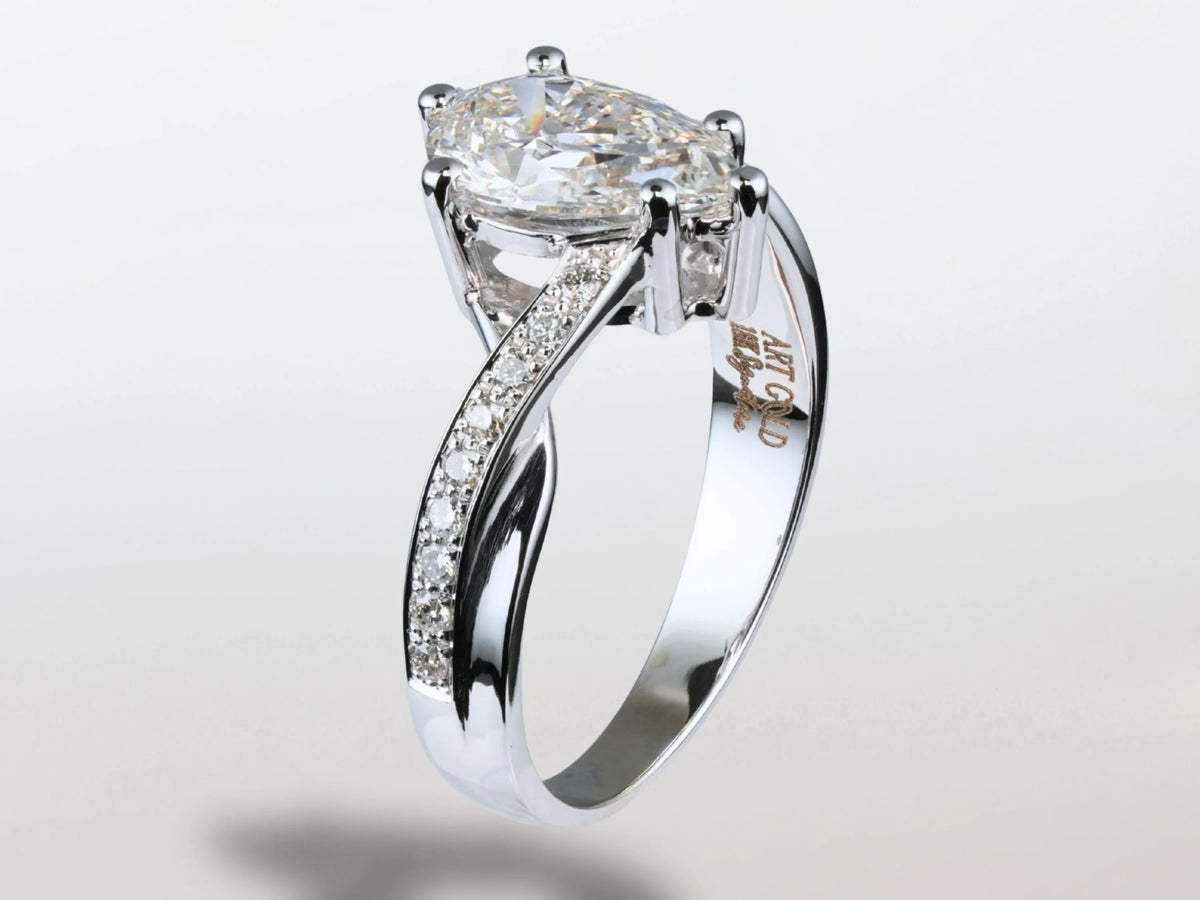 Pear Radiance lab-grown diamond engagement ring with marquise-cut center stone