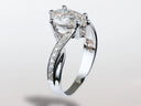 Pear Radiance lab-grown diamond engagement ring with marquise-cut center stone