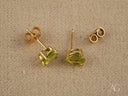 Peridot Radiance earrings: 18k gold pear-shaped peridot studs