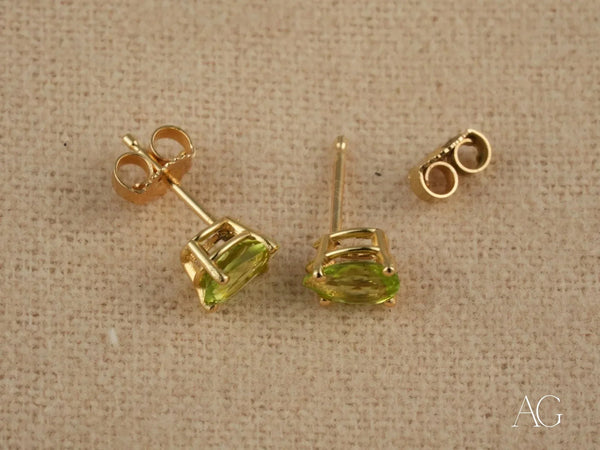 Peridot Radiance earrings: 18k gold pear-shaped peridot studs