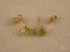 Peridot Radiance Earrings featuring 18k gold pear-shaped stud earrings with backs
