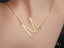 Gold-colored personalized necklace with letter M pendant in 18k gold jewelry style