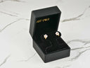 Petal Fantasy 18K gold flower CZ earrings in black velvet box